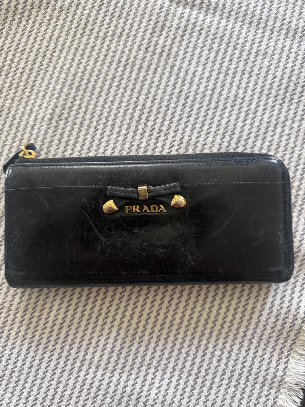 Prada Black Leather Bow Zip-Around Wallet with Gold Accents